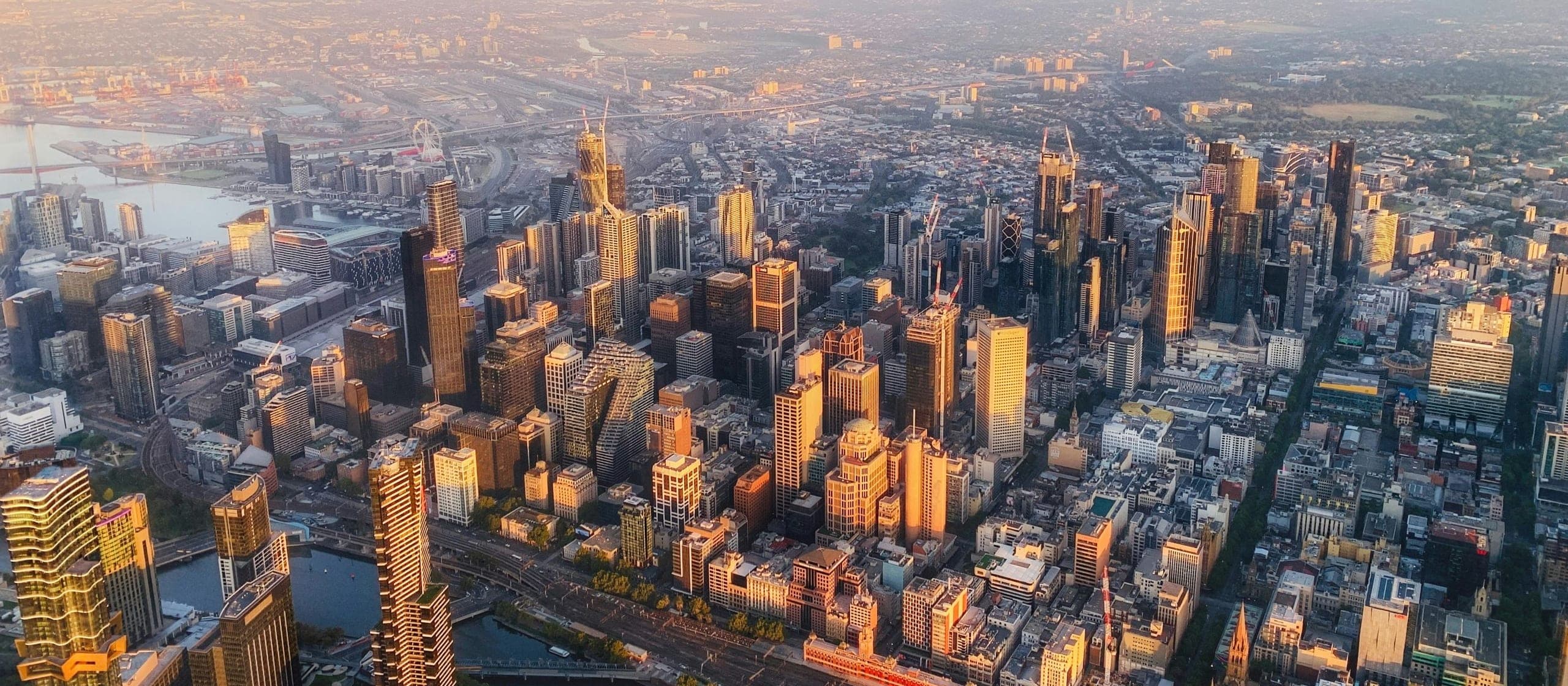 Melbourne's CBD from the air at golden hour